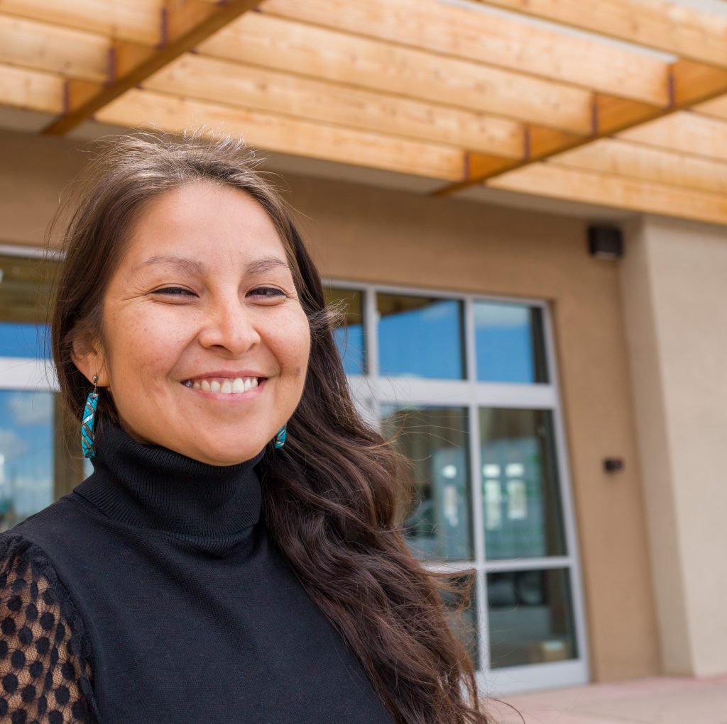 owner of Itality Plant Based Foods, Tina Archuleta, outside of her new building