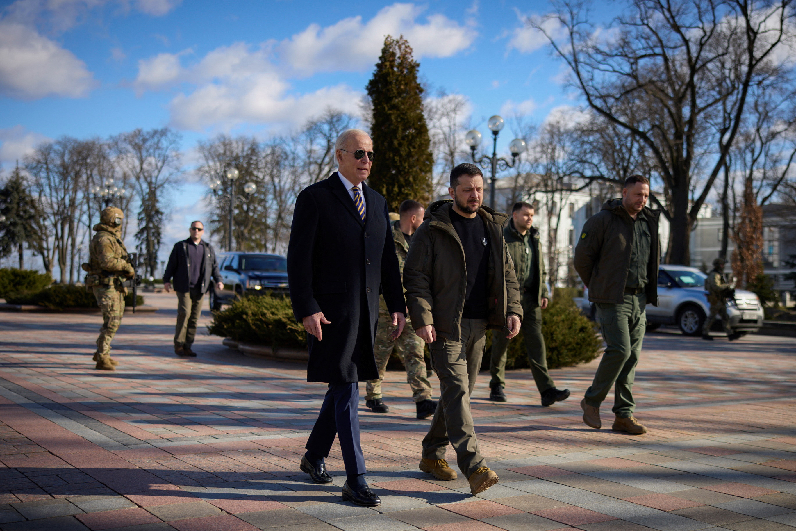 U.S. President Joe Biden walks with Ukrainian President Volodymyr Zelenskiy during an unannounced visit, in Kyiv, Ukraine, Monday, Feb. 20, 2023. Evan Vucci/Pool via REUTERS