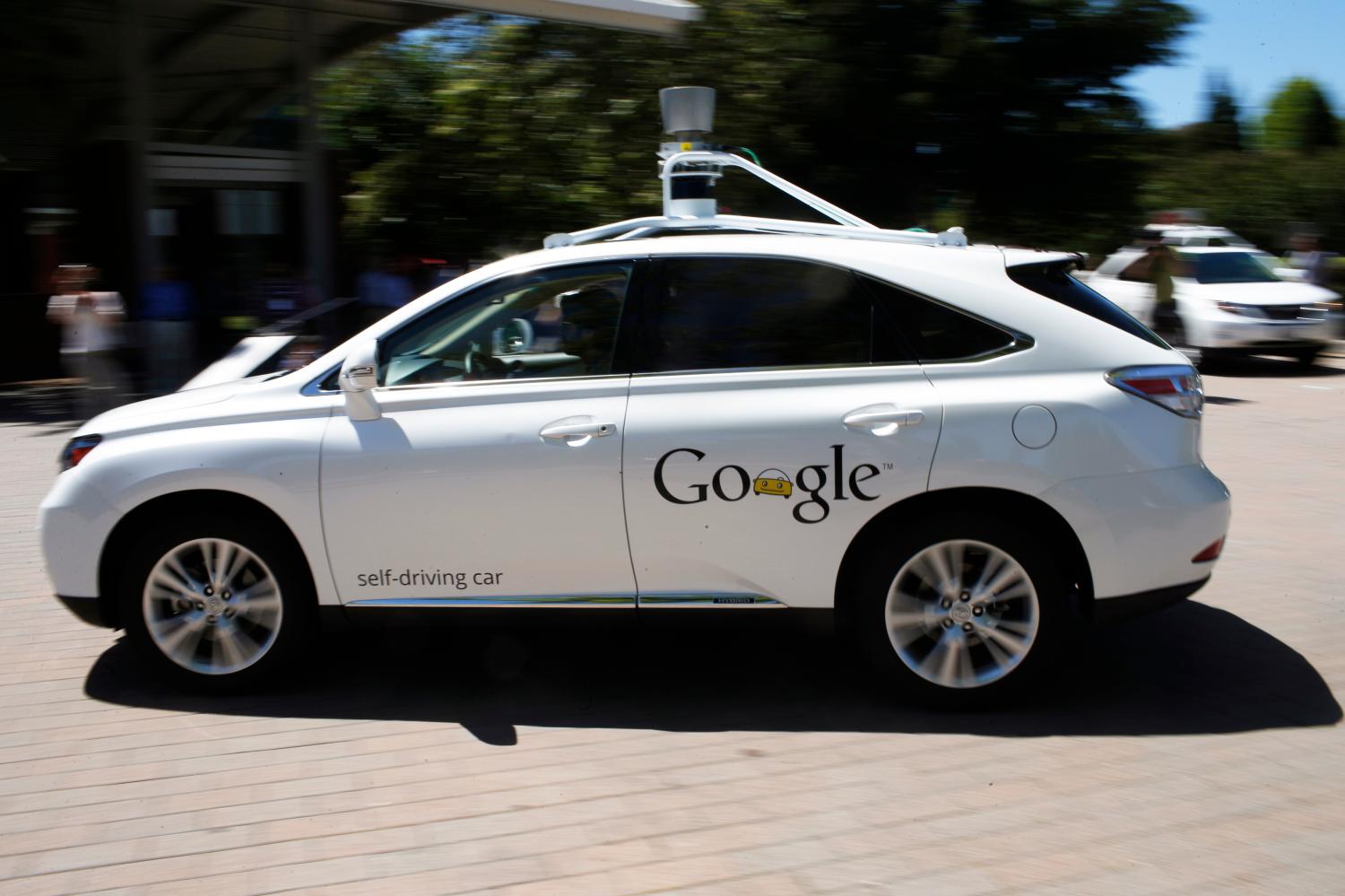 Reuters/Stephen Lam - Google self-driving vehicle drives around the parking lot at the Computer History Museum after a presentation in Mountain View, California May 13, 2014.