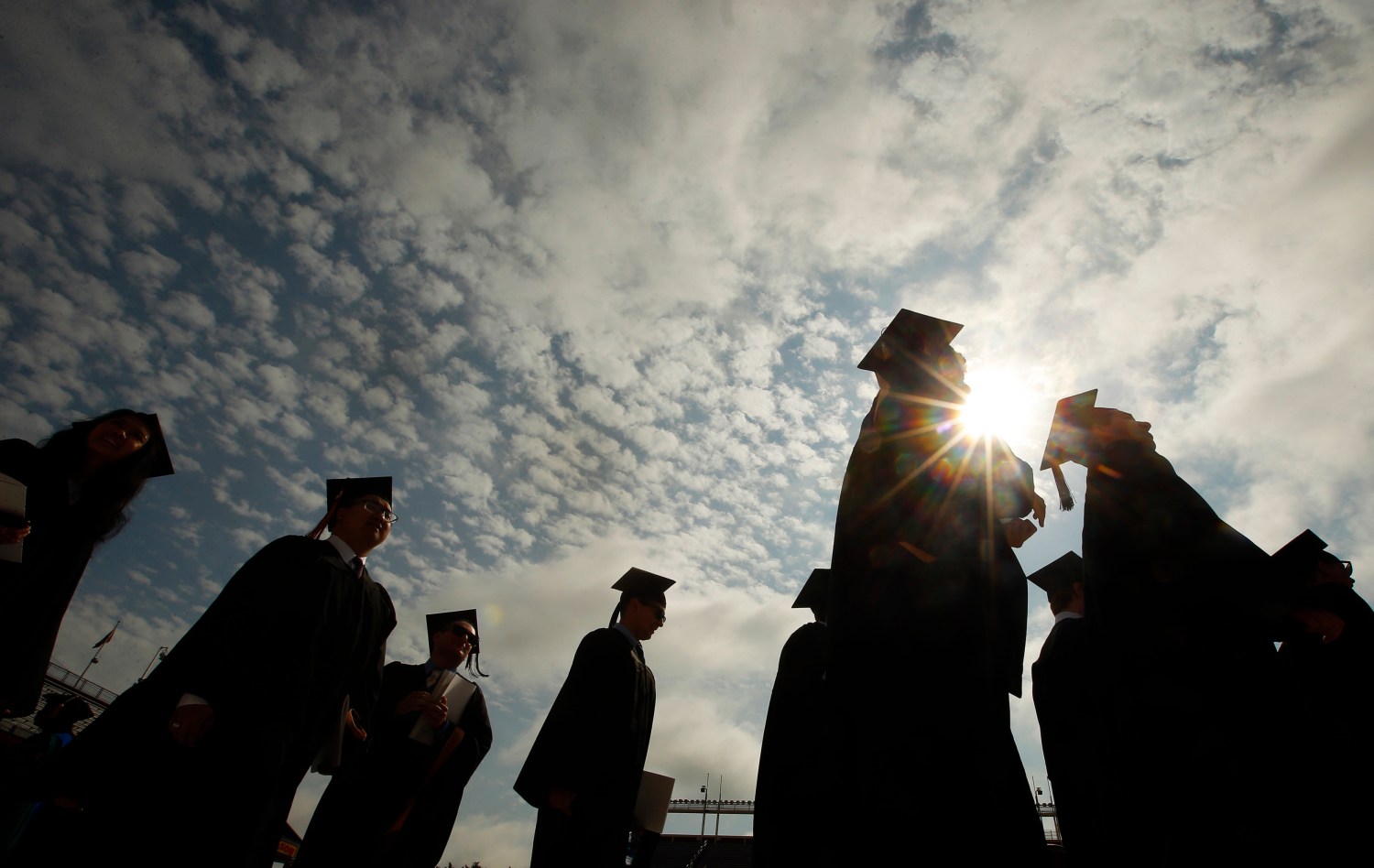 Graduating students arrive for Commencement Exercises at Boston College in Boston, Massachusetts, U.S. on May 20, 2013.