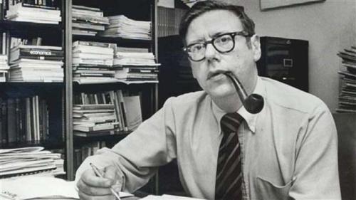 Arthur Okun in his office at Brookings, mid-1970s