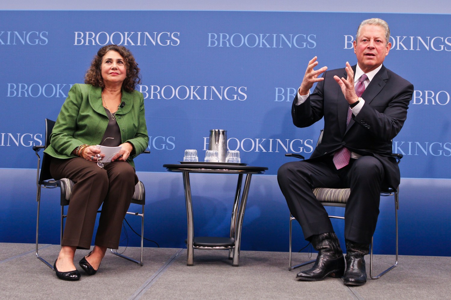 Elaine Kamarck, seated with Al Gore at Brookings.