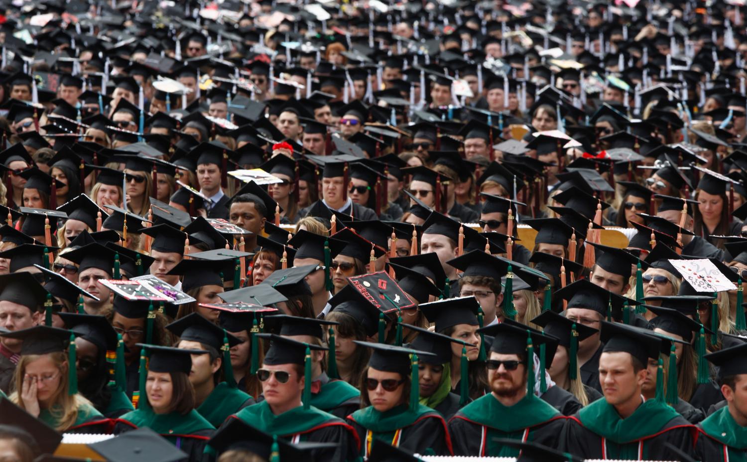 College students at graduation ceremony.