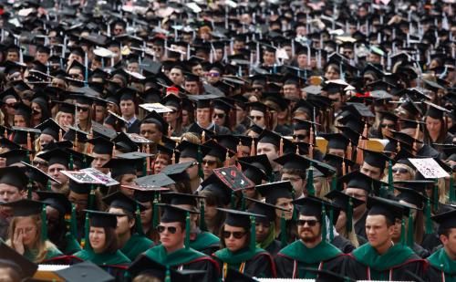 College students at graduation ceremony.