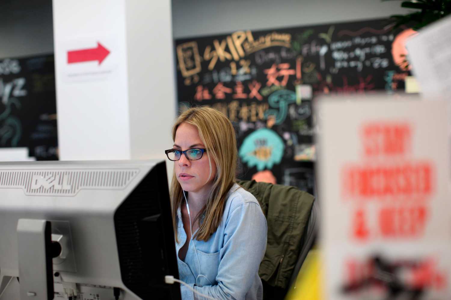 Woman at a computer in Facebook's office