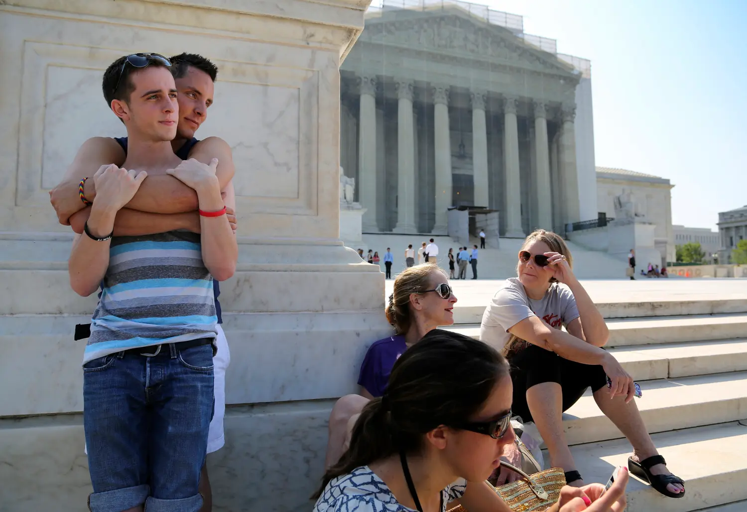 Gay couple on the steps of the Supreme Court