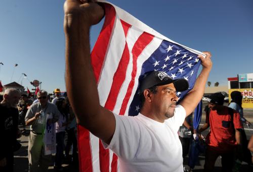 Man holding an American flag