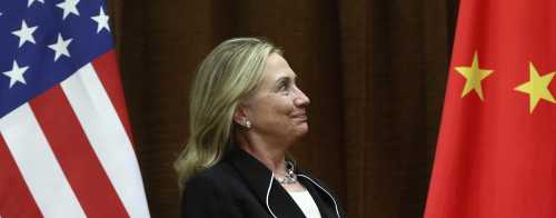 U.S. Secretary of State Hillary Clinton looks on during her meeting with China's Foreign Minister Yang Jiechi in Beijing September 4, 2012. China warned the United States not to get involved in South China Sea territorial disputes on Tuesday as Clinton arrived in Beijing pledging to pass on a strong message on the need to calm regional tension. REUTERS/Feng Li/Pool (CHINA - Tags: POLITICS) - RTR37GYZ