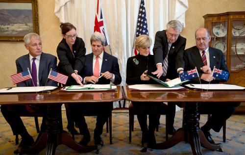 Australian Foreign Minister Julie Bishop (3rd R) and U.S. Secretary of State John Kerry (3rd L) prepare to sign a joint force posture agreement between the United States and Australia with U.S. Secretary of Defense Chuck Hagel (L) and Australian Defence Minister David Johnston at the AUSMIN meeting at Admiralty House in Sydney, August 12, 2014. REUTERS/Jason Reed (AUSTRALIA - Tags: POLITICS MILITARY) - RTR42248