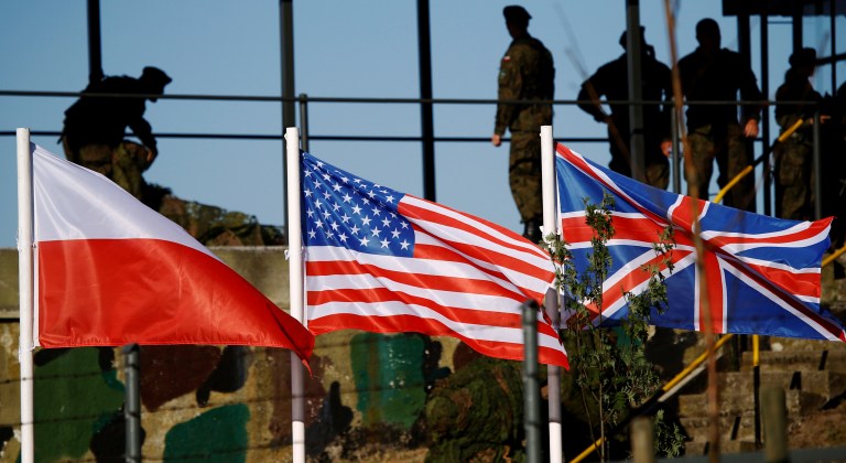 Polish, U.S. and British flags are seen during the NATO allies' Anakonda 16 exercise near Torun, Poland, June 7, 2016. REUTERS/Kacper Pempel