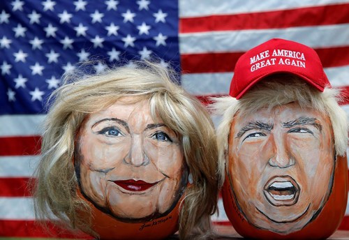 Images of Hillary Clinton and Donald Trump in front of U.S. flag