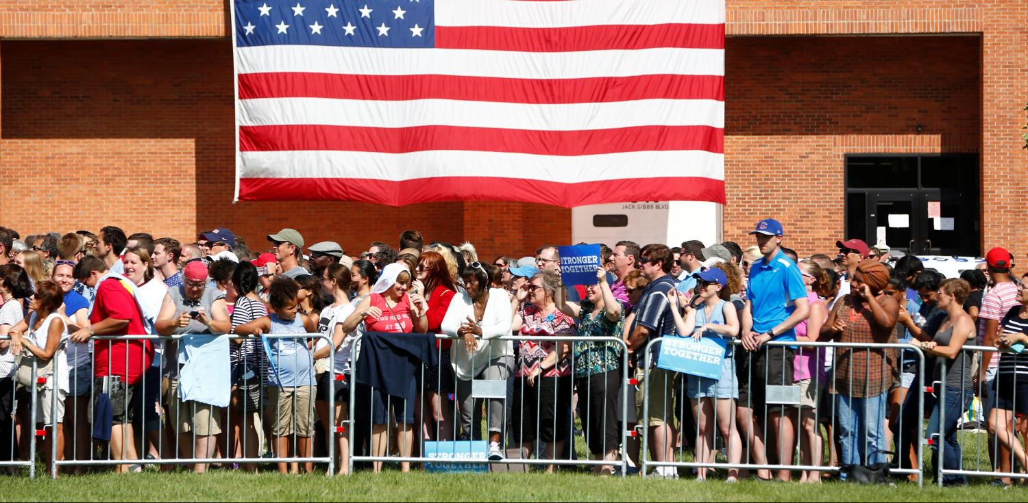 REUTERS/Aaron P. Bernstein - Supporters look on as Democratic presidential nominee Hillary Clinton campaigns with vice presidential nominee Senator Tim Kaine (D-VA) at Fort Hayes Metropolitan Education Center in Columbus, Ohio, U.S., July 31, 2016.