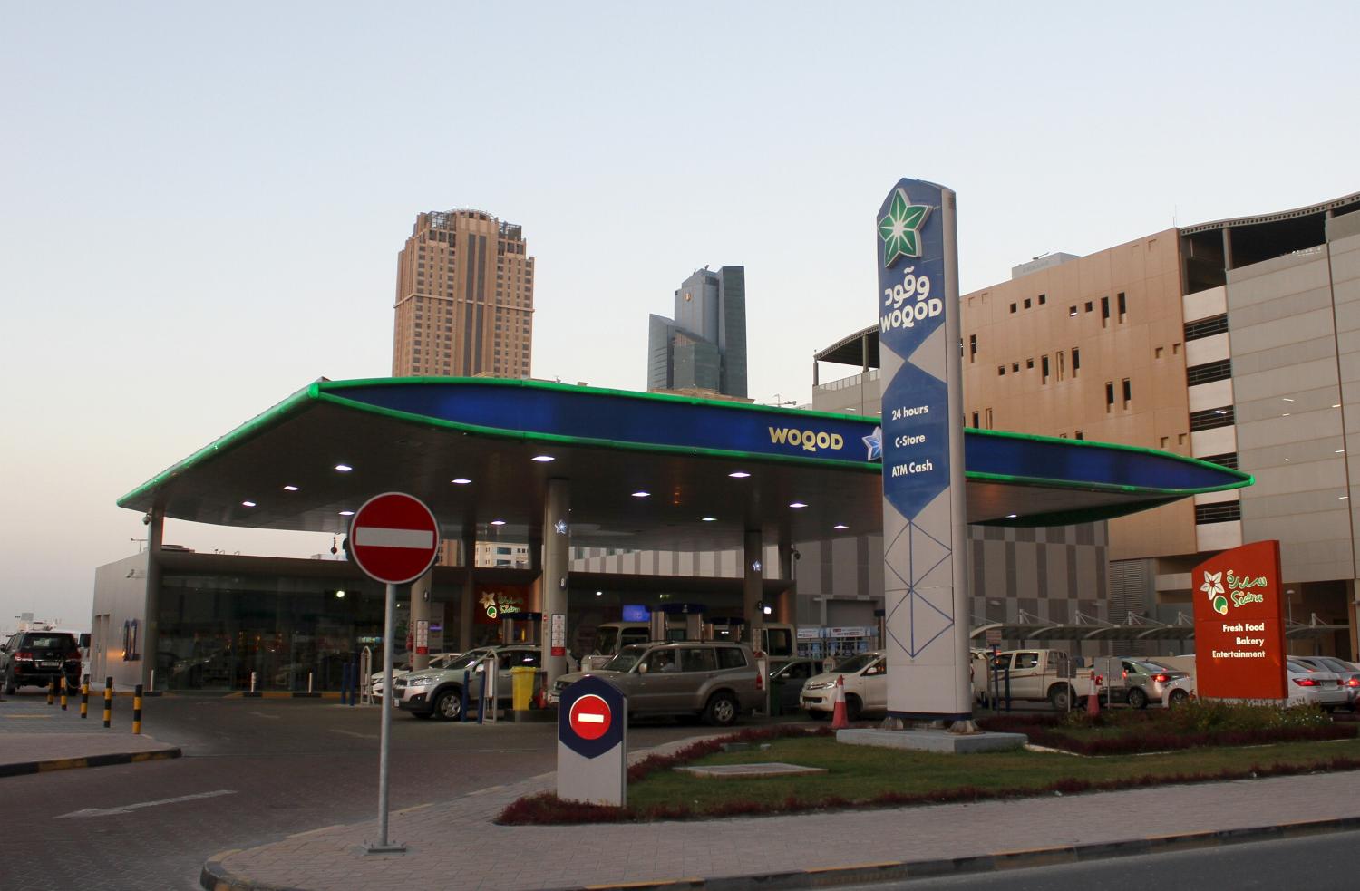 Cars are seen at Woqod gas station in Doha, Qatar January 28, 2016. REUTERS/Naseem Zeitoon