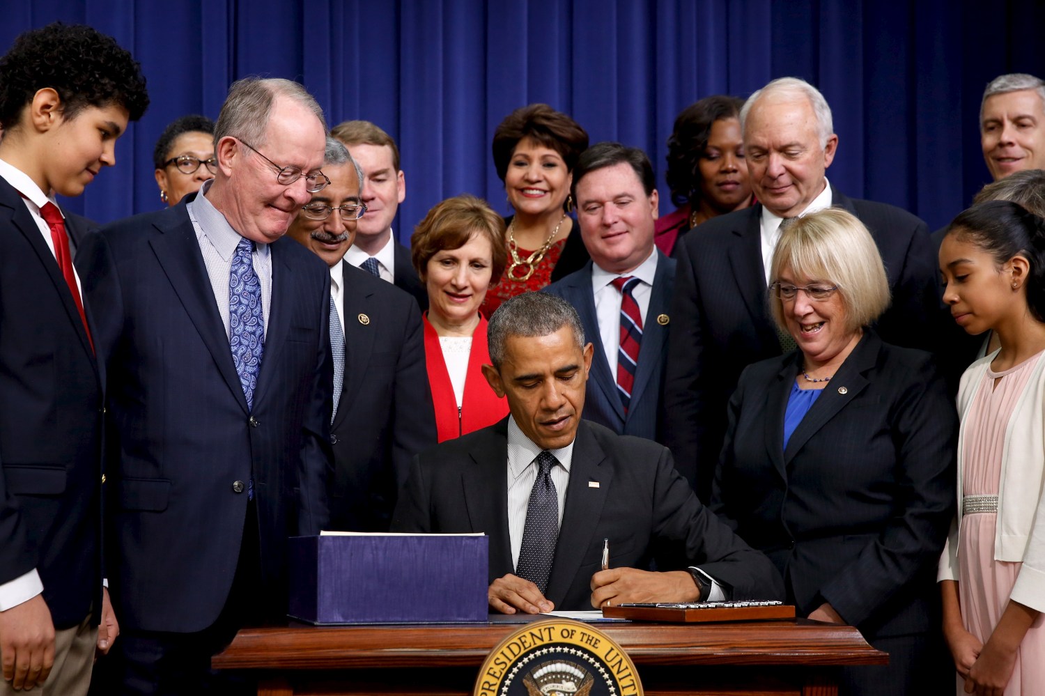 Obama signs the Every Student Succeeds Act