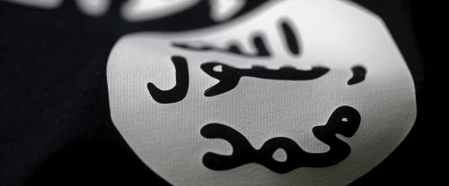 An Islamic State flag is seen in this picture illustration taken February 18, 2016. REUTERS/Dado Ruvic/Illustration/File Photo