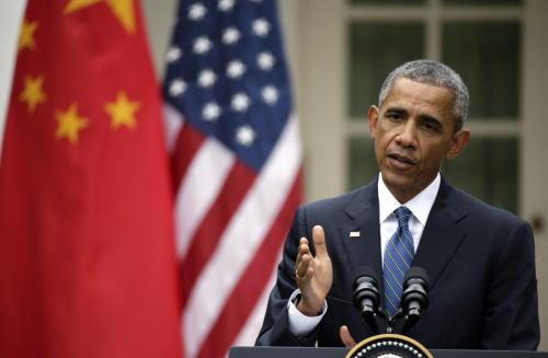 U.S. President Barack Obama (R) addresses a joint news conference with Chinese President Xi Jinping in the Rose Garden at the White House in Washington September 25, 2015. REUTERS/Gary Cameron - RTX1SHK8