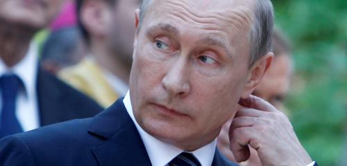 Russian President Vladimir Putin attends the commemoration of 100 years of the Russian chapel in Vrsic, Slovenia, July, 30, 2016. The Russian chapel was built in 1916 in memory of 250 Russian prisoners of war who were caught in an avalanche while building the road over the Vrsic. REUTERS/Srdjan Zivulovic - RTSKDNR