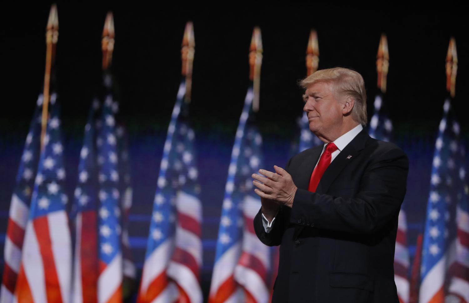 Republican U.S. presidential nominee Donald Trump takes the stage to formally accept the nomination on the last day of the Republican National Convention in Cleveland, Ohio, U.S. July 21, 2016. REUTERS/Brian Snyder