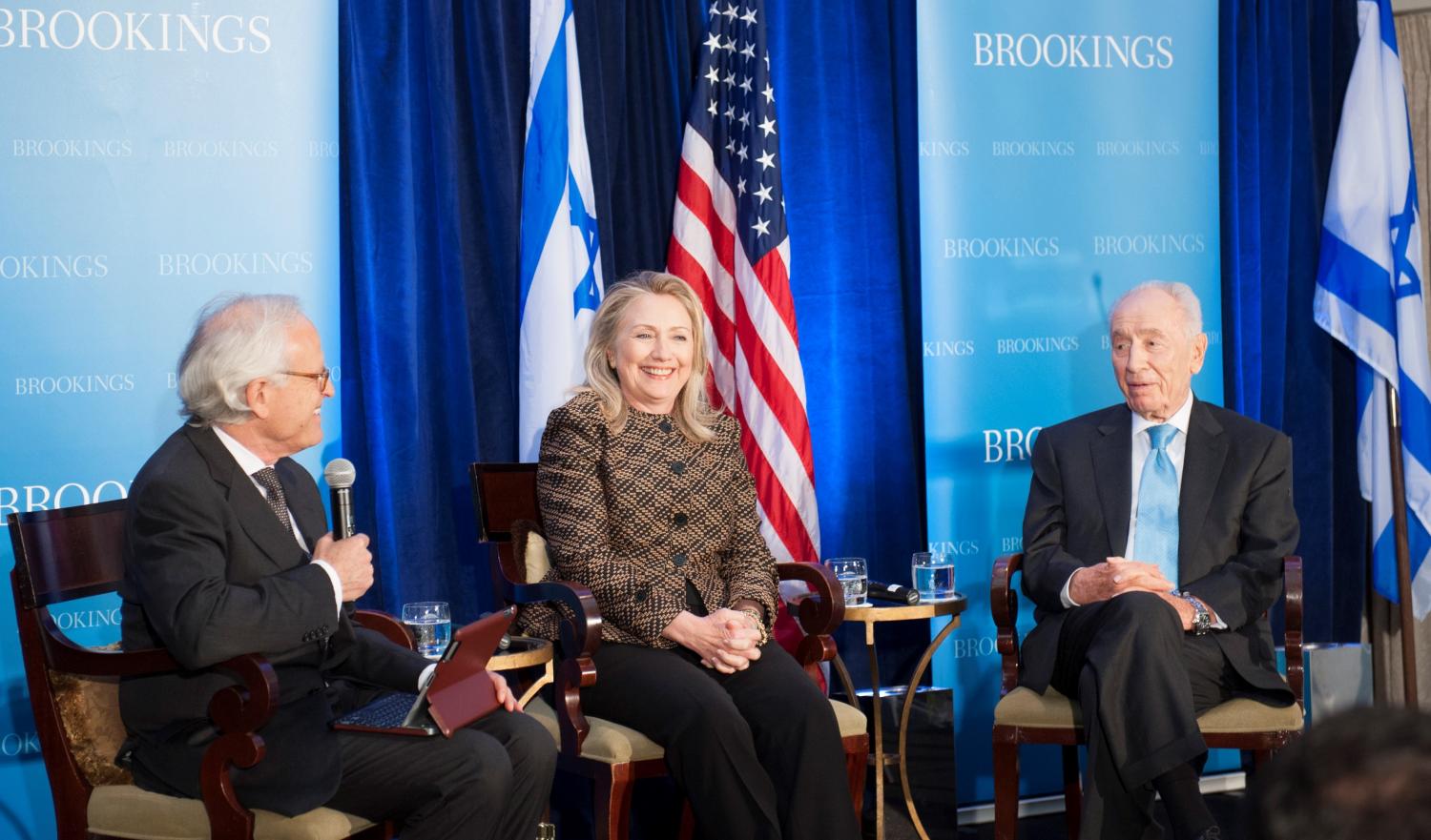 Brookings Executive Vice President Martin Indyk. U.S. Secretary of State Hillary Clinton, and former Israeli President Shimon Peres speak at an event at Brookings on June 12, 2012.