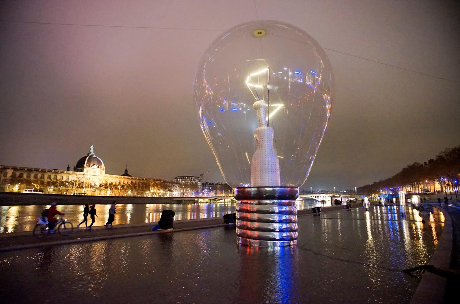View of a giant incandescent light bulb as part of the Incandescence installation by artist Severine Fontaine during the rehearsal for the Festival of Lights in central Lyon