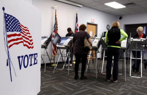 Voters in Ohio cast their ballots using electronic monitors.