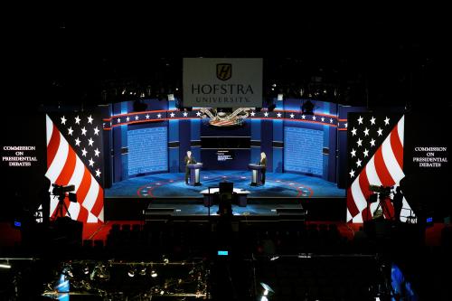 Hostra University students playing the roles of the candidates and moderator go through a rehearsal for the first U.S. presidential debate at Hofstra University in Hempstead, New York September 25, 2016. Left to right are Joseph Burch, Christian Stewart and Caroline Mullen. REUTERS/Rick Wilking - RTSPCX3