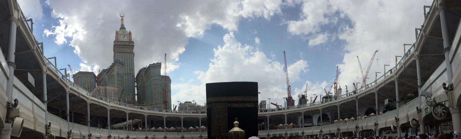 Construction cranes are seen next to the Grand Mosque as Muslims circle the Kaaba and pray during Umrah Mawlid al-Nabawi "Birthday of Prophet Mohammad", with the Mecca Clock Tower in the background, in the holy city of Mecca, Saudi Arabia January 18, 2016. The area surrounding the Grand Mosque is currently undergoing an expansion to accommodate more pilgrims, Umrah performers and visitors, according to local media. Picture taken January 18, 2016. REUTERS/Amr Abdallah Dalsh - RTX25AB6