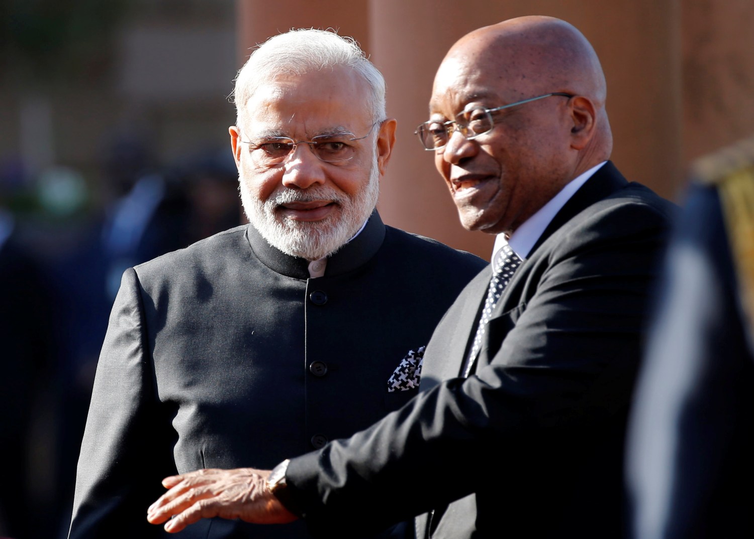 South Africa's President Jacob Zuma gestures next to India's Prime Minister Narendra Modi (L) during his state visit at the Union Buildings in Pretoria, South Africa July 8, 2016. REUTERS/Siphiwe Sibeko - RTX2KABT