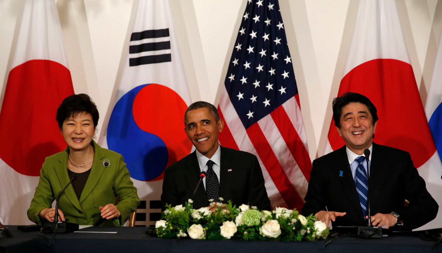 U.S. President Barack Obama participates in a tri-lateral meeting with President Park Geun-hye of the South Korea (L) and Prime Minister Shinzo Abe of Japan (R)