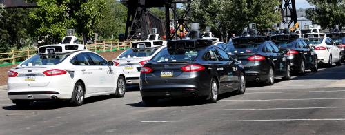 A fleet of Uber's Ford Fusion self driving cars are shown during a demonstration of self-driving automotive technology in Pittsburgh, Pennsylvania, U.S. September 13, 2016. REUTERS/Aaron Josefczyk