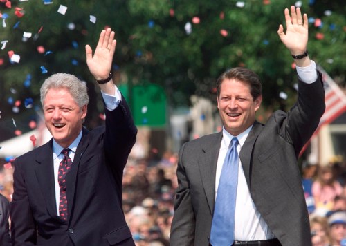 U.S. Vice President and Democratic Presidential hopeful Al Gore joins U.S. President Bill Clinton at a rally in Monroe, Michigan, August 15, 2000.