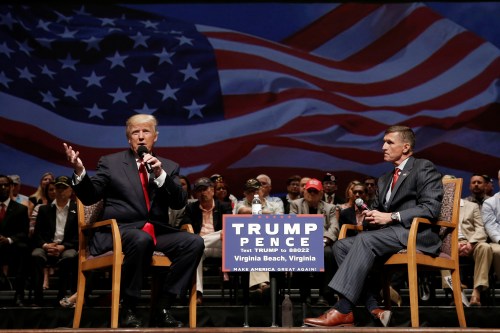 Republican presidential nominee Donald Trump (L) speaks along side retired U.S. Army Lieutenant General Mike Flynn during a campaign town hall meeting in Virginia Beach, Virginia, U.S., September 6, 2016. REUTERS/Mike Segar - RTX2OE5F