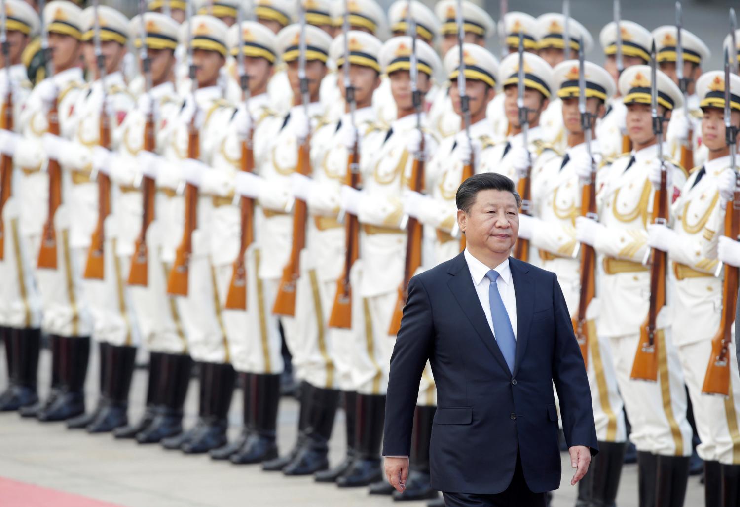 China's President Xi Jinping reviews honour guards during a welcoming ceremony for Peru's President Pedro Pablo Kuczynski (not in picture) at the Great Hall of the People in Beijing, China, September 13, 2016. REUTERS/Jason Lee - RTSNI5U