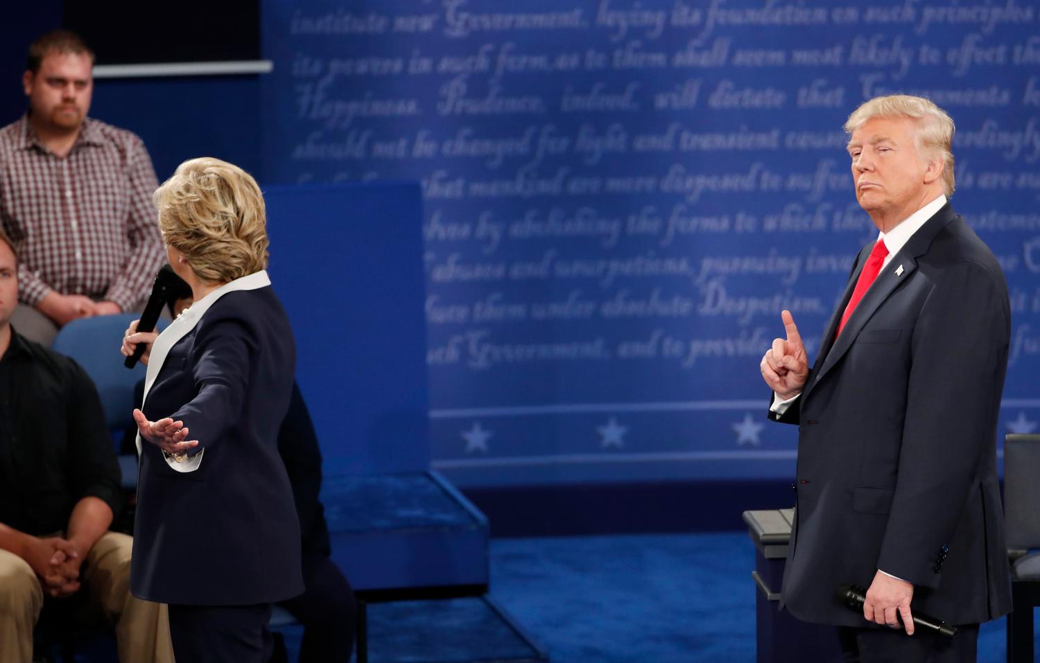 Democratic U.S. presidential nominee Hillary Clinton speaks during the presidential town hall debate with Republican U.S. presidential nominee Donald Trump at Washington University in St. Louis, Missouri, U.S., October 9, 2016. REUTERS/Lucy Nicholson - RTSRIZC