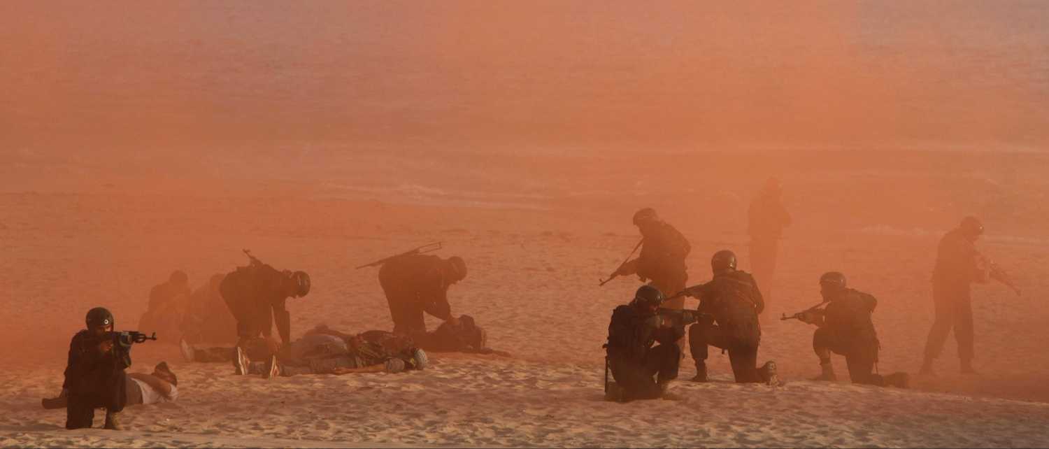 Pakistan Navy special forces conduct a counter terrorism exercise during the "AMAN 13" multi-national naval exercise in Karachi March 5, 2013. "AMAN 13" is the fourth in its biennial series of exercises being conducted off Pakistan's coast, the Pakistan Navy said in a statement. REUTERS/Akhtar Soomro (PAKISTAN - Tags: MILITARY) - RTR3ELV3