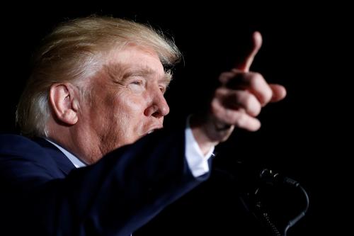 Republican presidential nominee Donald Trump attends a campaign event on the tarmac of the airport in Kinston, North Carolina, U.S., October 26 2016. REUTERS/Carlo Allegri - RTX2QMKN