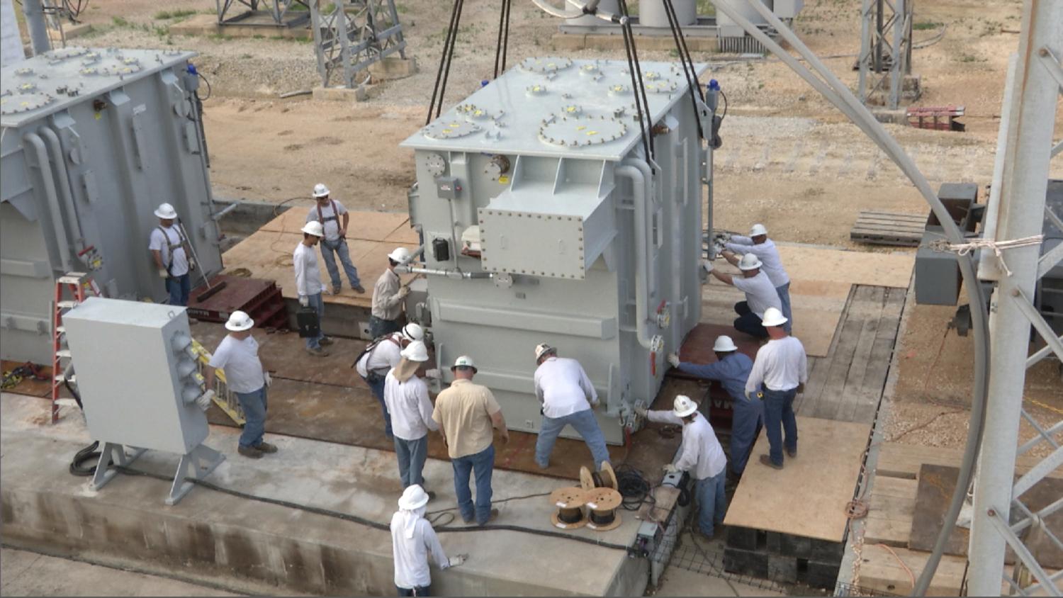 A trio of transformers weighing about 250,000 pounds each are trucked from St. Louis, Missouri to Houston, Texas in this March 13, 2012 photograph, as part of a Department of Homeland Security exercise to see how quickly replacement transformers could be set up in the event of a major disruption to the U.S. power grid.