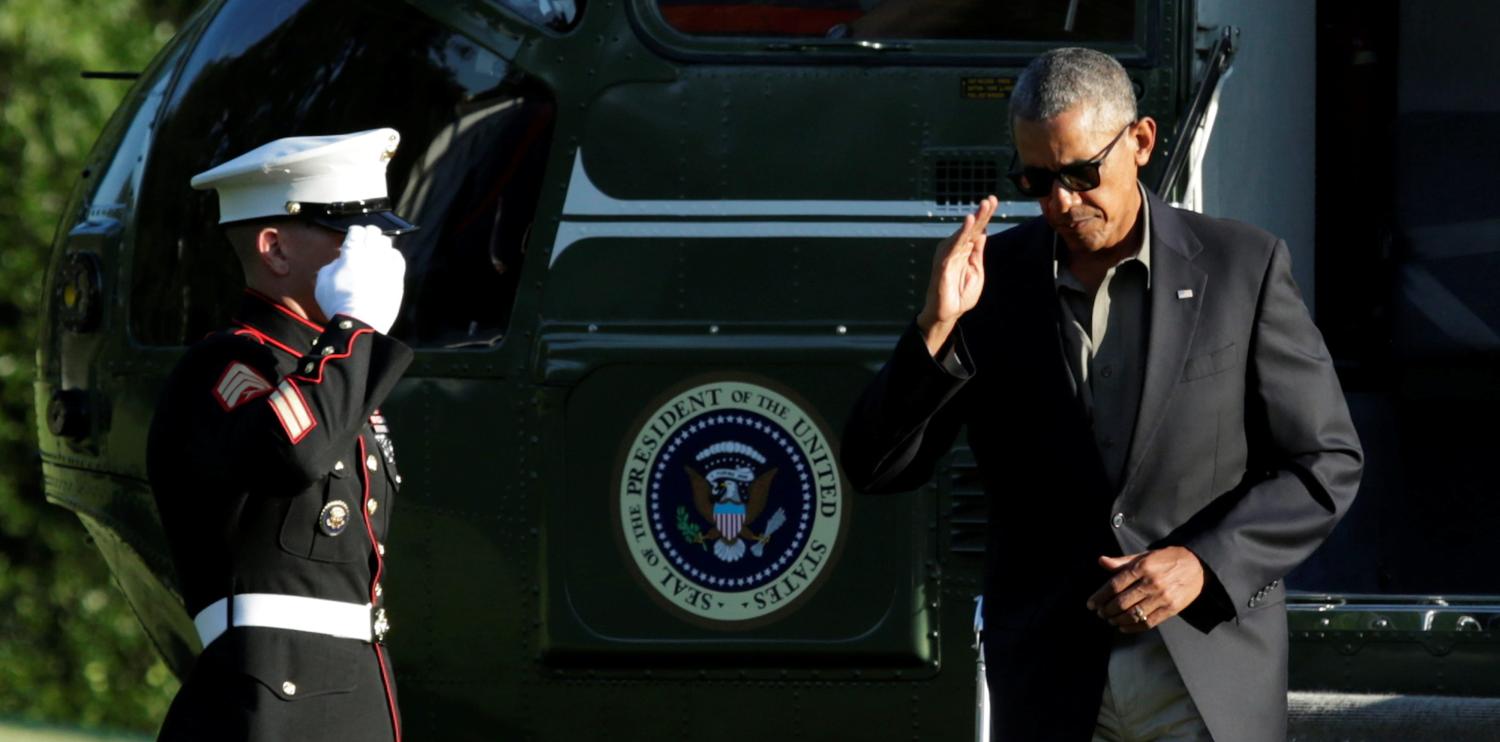 U.S. President Barack Obama salutes upon his return to the White House in Washington, U.S. after visiting flood damage area in Baton Rouge, Louisiana, August 23, 2016. REUTERS/Yuri Gripas - RTX2MRF7