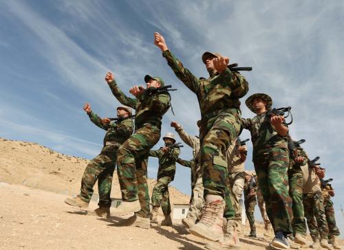 Christian volunteers, who have joined the Kurdish Peshmerga fighters, take part in a training at a training base in the town of Alqosh, 50 km (30 miles) from Mosul, Iraq, October 11, 2016. Picture taken October 11, 2016. REUTERS/Ari Jalal - RTX2PAYJ