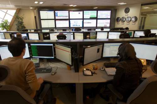 Technicians monitor data flow in the control room of an internet service provider in Tehran