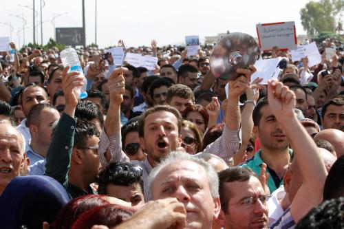 Protesters, who are mostly school teachers, demonstrate on a street in Sulaymaniyah province, Iraq, against the Kurdish regional government