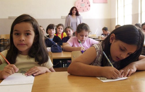 MACEDONIAN CHILDREN WORK ON THE FIRST DAY OF SCHOOL