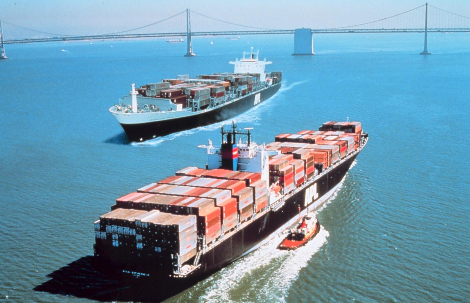 Two trade ships sailing in the ocean.