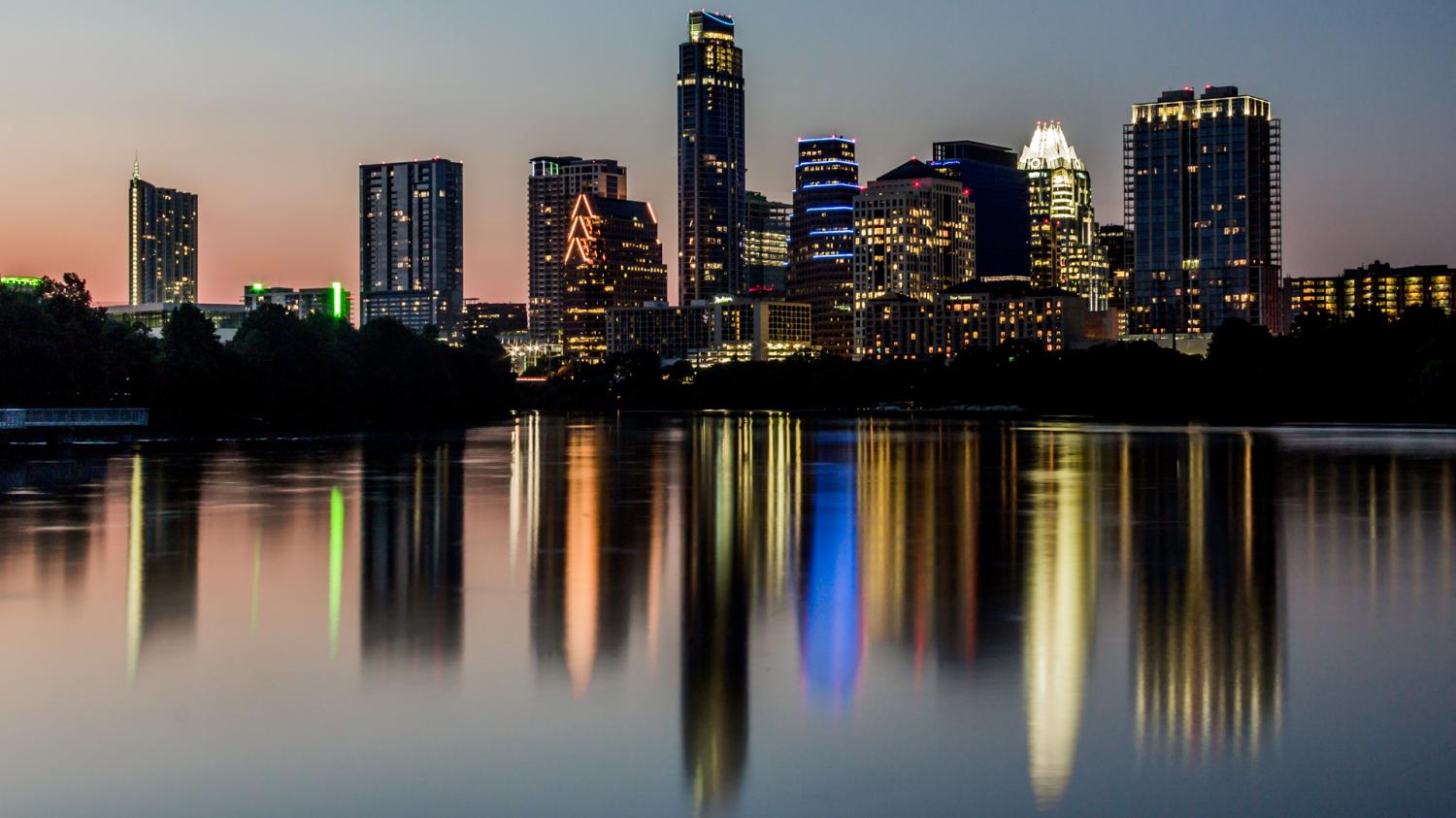 The Austin cityscape as seen from the new boardwalk on Lady Bird Lake. Photo taken by Argash on August 6,2014 (WIKIMEDIA).