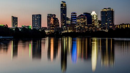 The Austin cityscape as seen from the new boardwalk on Lady Bird Lake. Photo taken by Argash on August 6,2014 (WIKIMEDIA).