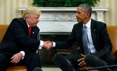 U.S. President Obama and President-elect Donald Trump shake hands in the White House Oval Office in Washington