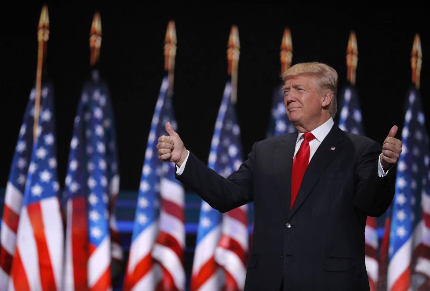 Republican U.S. presidential nominee Donald Trump gives two thumbs up as he arrives to speak during the final session at the Republican National Convention in Cleveland, Ohio, U.S. July 21, 2016. REUTERS/Brian Snyder TPX IMAGES OF THE DAY - RTSJ4FT