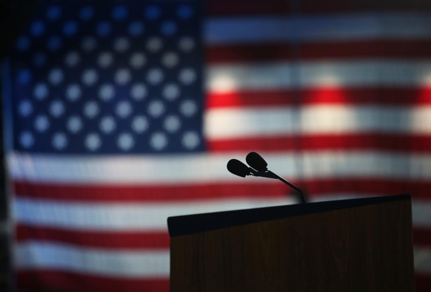 Microphones stand at the podium after U.S. Democratic presidential nominee Hillary Clinton's campaign chairman John Podesta addressed supporters at the election night rally in New York, U.S., November 9, 2016. REUTERS/Adrees Latif - RTX2SPD8