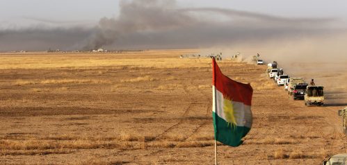 A Kurdish flag is seen on a military vehicles of the Kurdish Peshmerga forces on the southeast of Mosul , Iraq, August 14, 2016. REUTERS/Azad Lashkari - RTX2KRSI