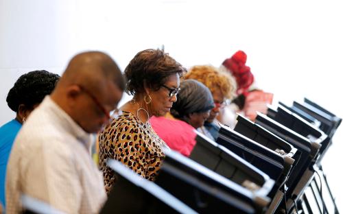 Voters cast their ballots during early voting